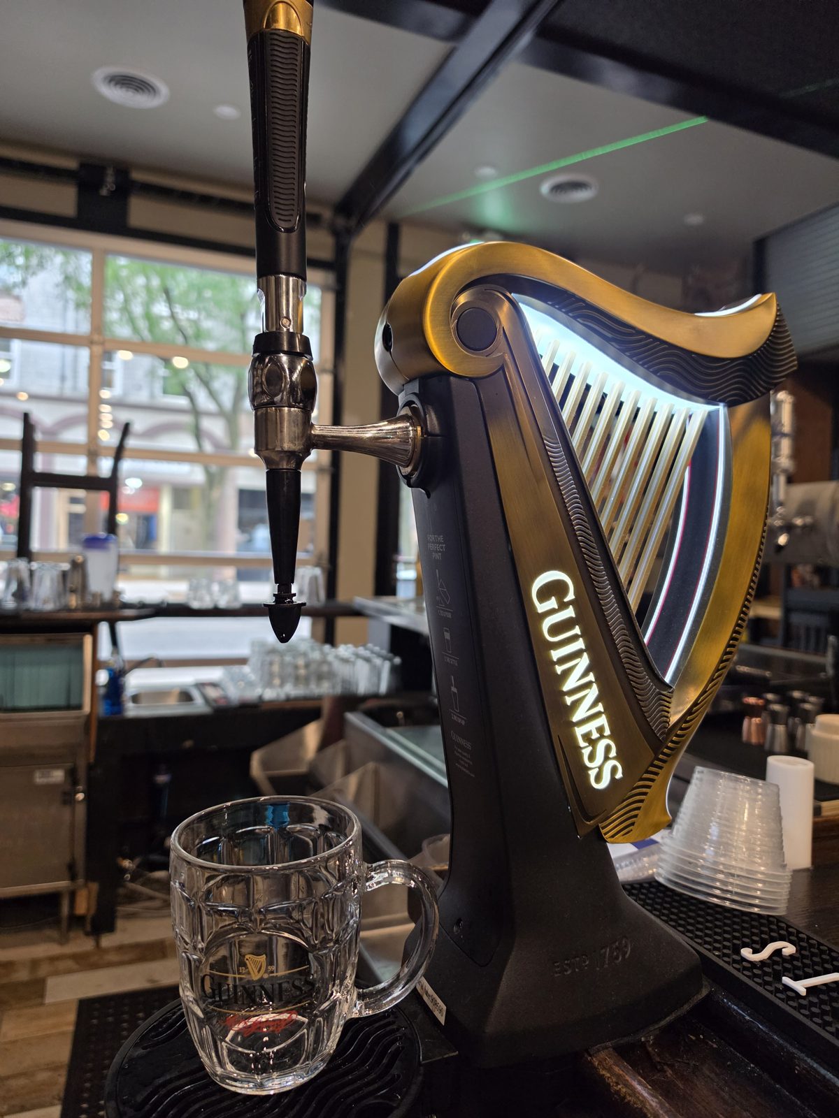 Close-up of the Guinness harp tap